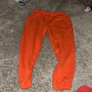 orange universal thread medium sweats